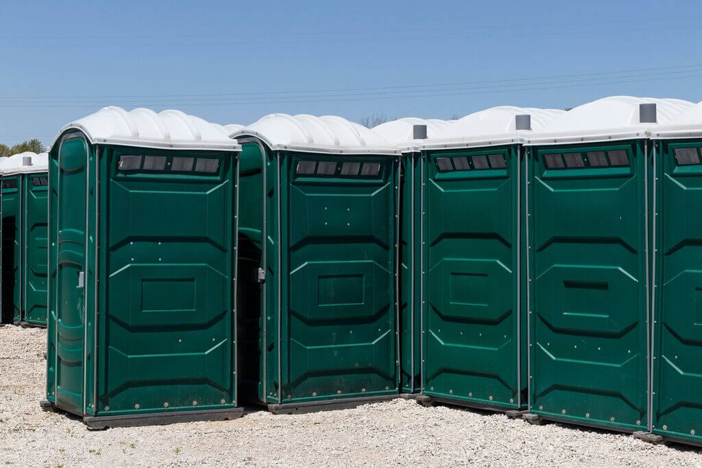 Group of Porta Potties On a Construction Site